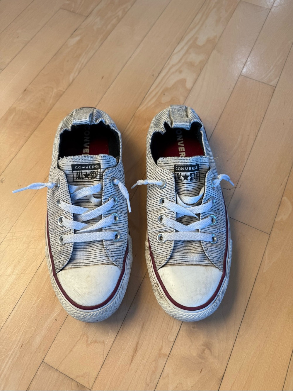 Converse All-Star Low Top Slip On Sneakers in Blue/White with Red Stripe